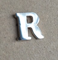 "R" Retired Badge 1064