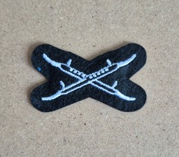 Crossed Stretcher Badge Cloth 1089